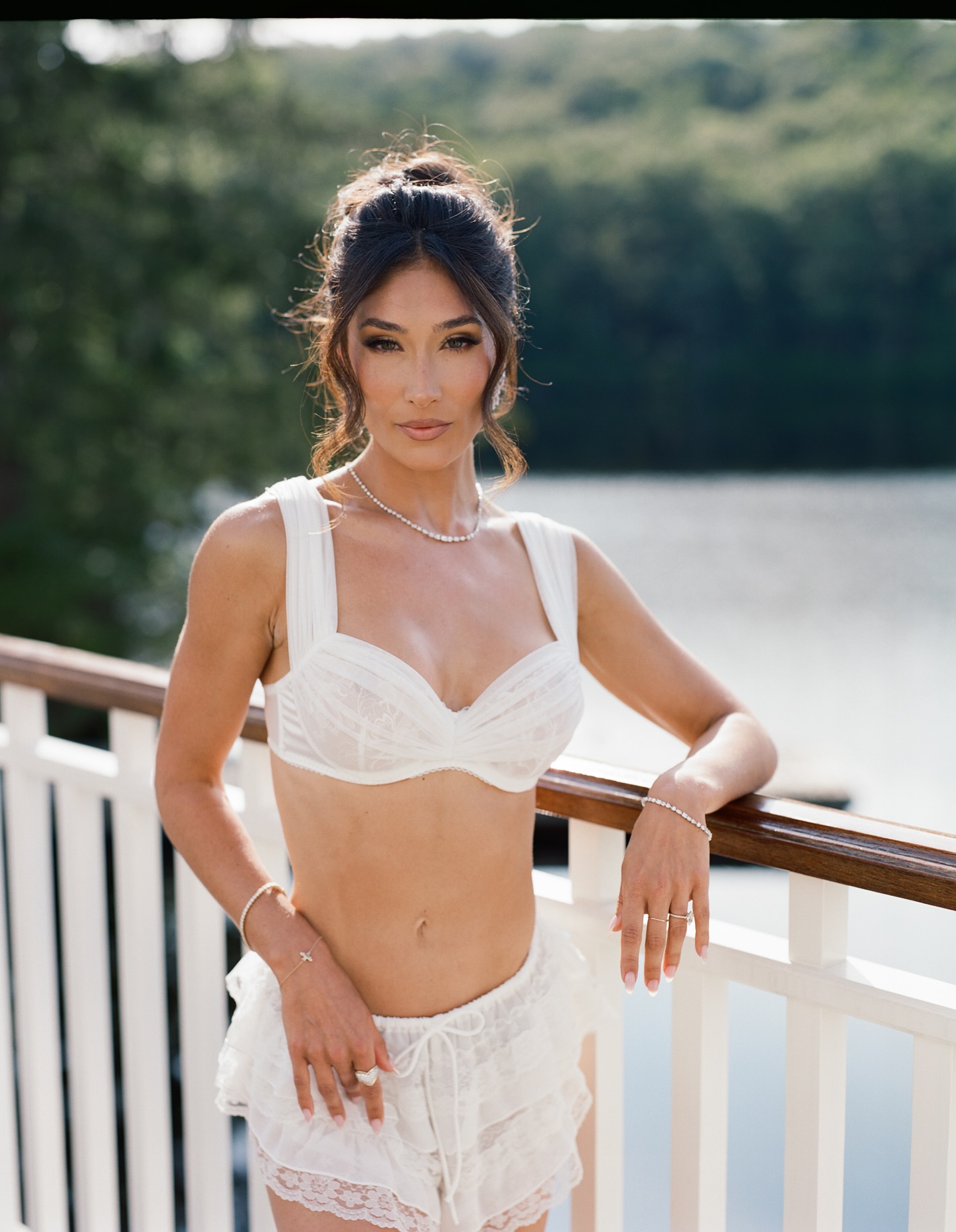 Bride with elegant updo and natural glam makeup by Doorbell Salon CT