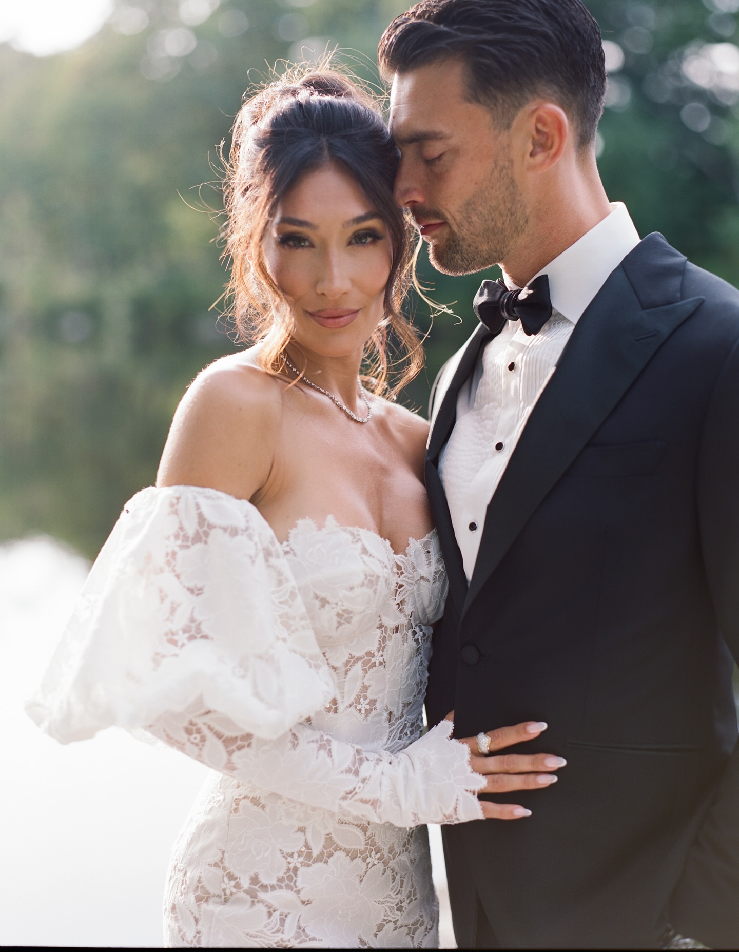 Romantic bride and groom portrait with lace gown styled by Doorbell Salon CT